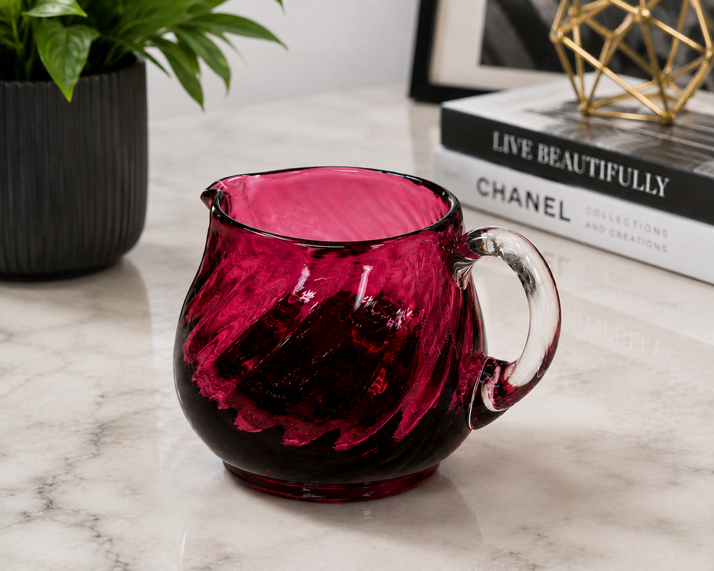 CS-12--English Cranberry Ruby Red Art Glass Creamer – Draped Optic Pattern – Clear Handle – 3"