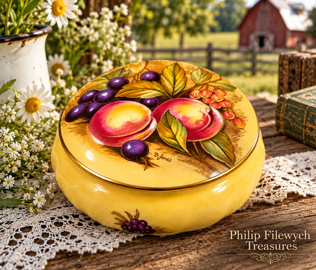 Aynsley Orchard Gold trinket dish displayed in a charming farm setting