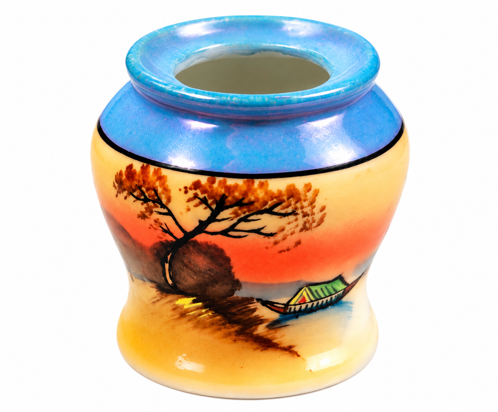 Vintage Japanese porcelain toothpick holder with hand-painted fishing boat and sunset design on a white background.