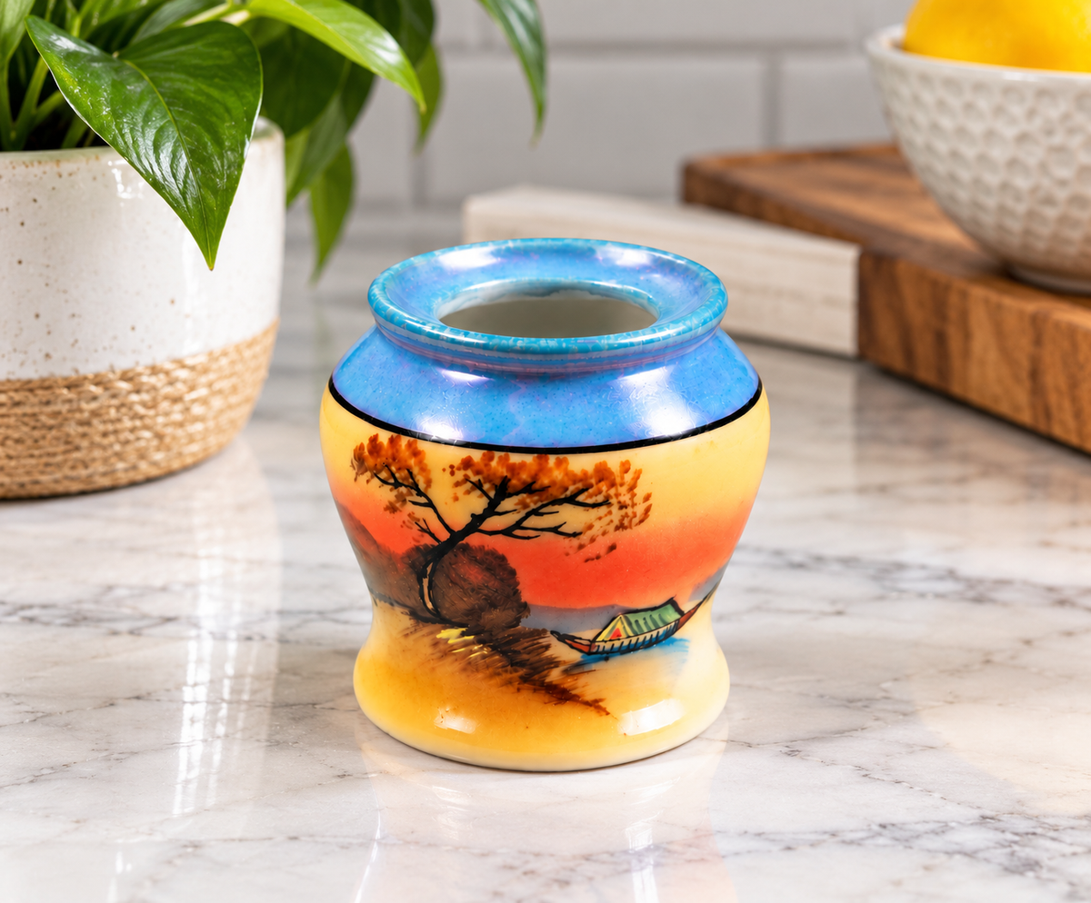 Vintage hand-painted porcelain toothpick holder displayed in a modern kitchen